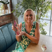 Jo holding trophy for Small Business of the Year