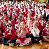 School children supporting National Smile month